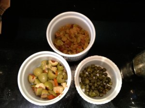 The secret ingredients to kid-friendly chili: sweet golden raisins, tangy olives and capers